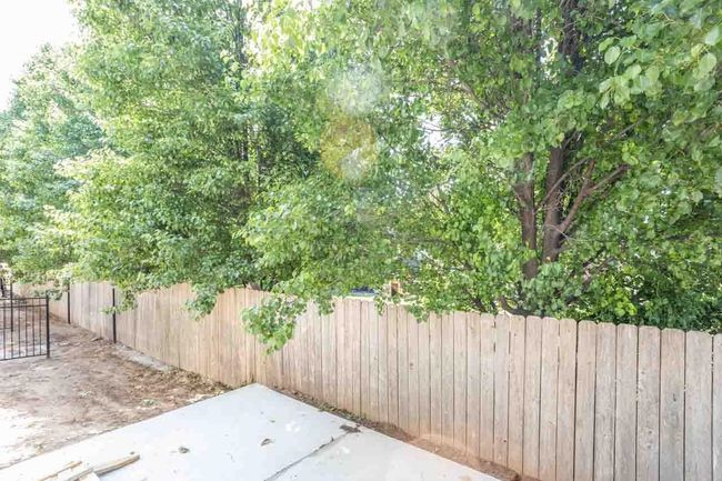 Fenced backyard featuring a patio | Image 30