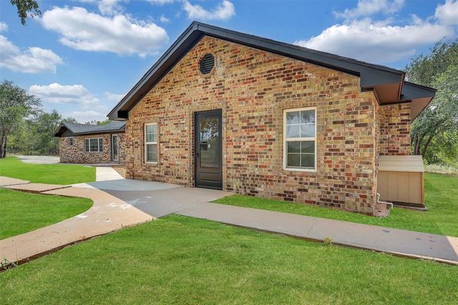 View of front property with a front lawn | Image 8