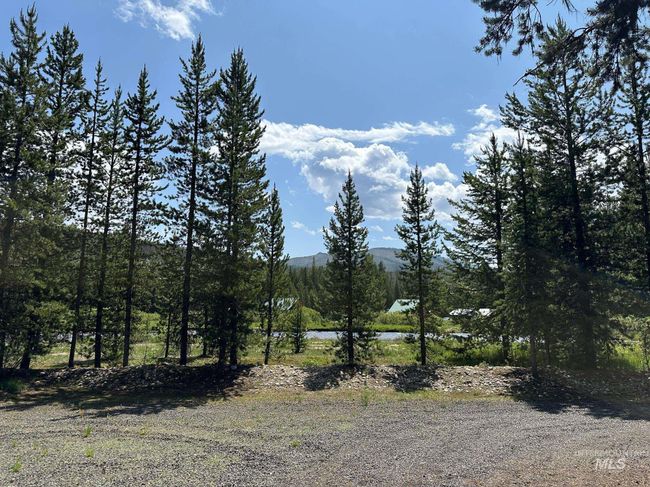 Mountain view with a large body of water | Image 23