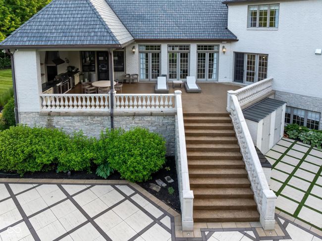 back of property featuring stairway | Image 96