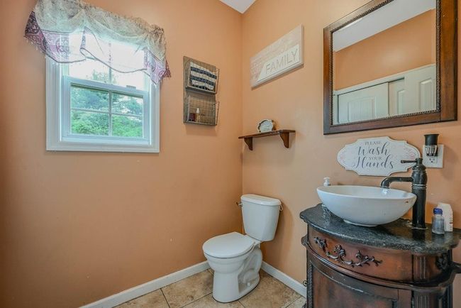Half Bathroom Off Of Kitchen With Closet | Image 15