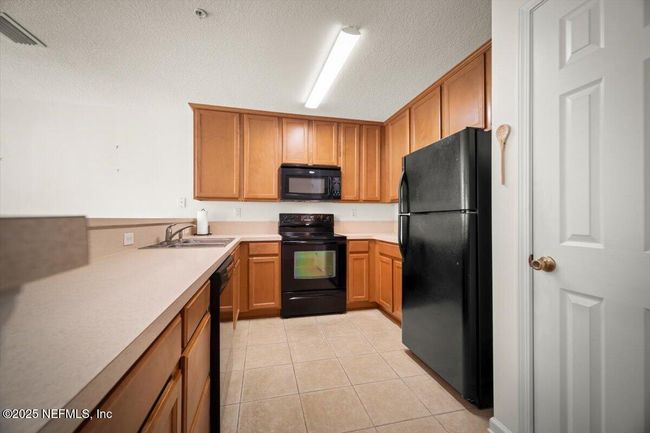 872 S Black Cherry Dr, Condo with 2 bedrooms, 3 bathrooms and null parking in Saint Johns FL | Image 9