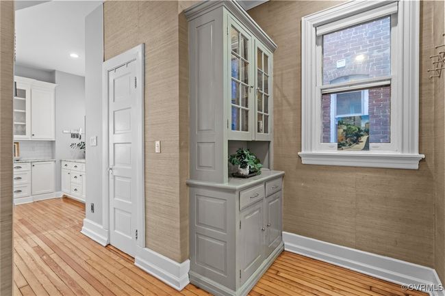 Hall featuring baseboards, light wood finished floors, and recessed lighting | Image 11