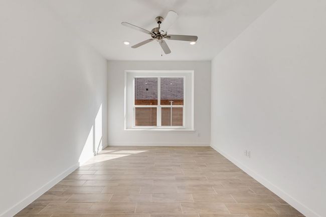 Unfurnished room with ceiling fan, light wood-type flooring, and recessed lighting | Image 4
