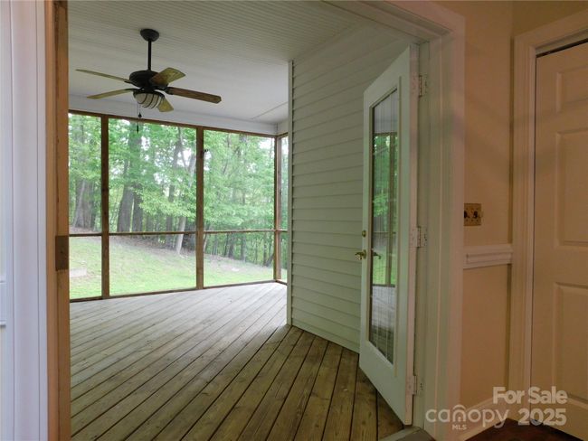 Access to screened-in porch from kitchen. | Image 15
