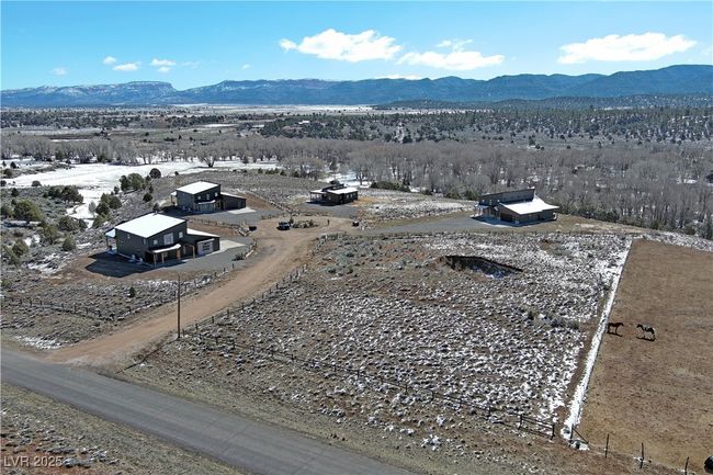 View from above of property with mountains | Image 23