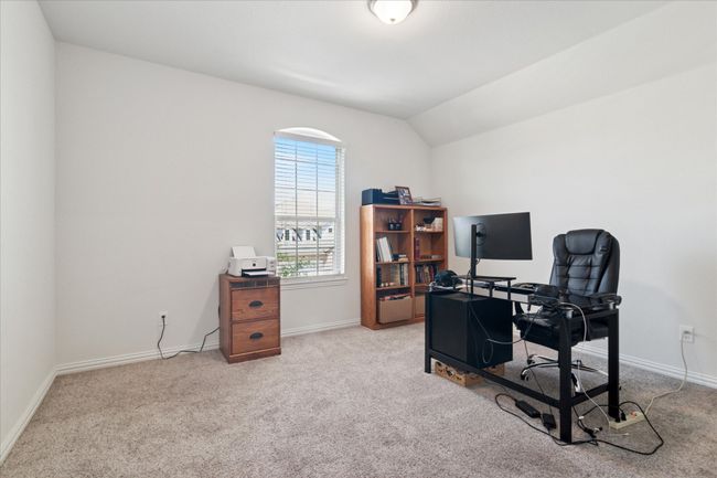 Upstairs bedroom currently being used as an office. | Image 35