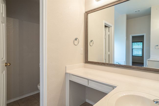 Master bathroom featuring separate toilet room | Image 24