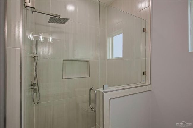 Bathroom featuring walk in shower | Image 10