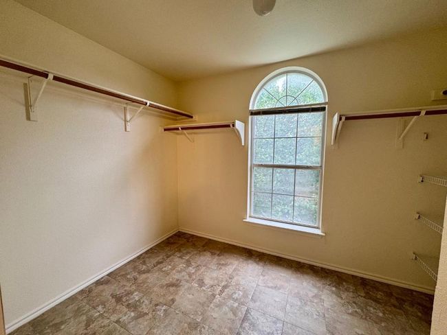 View of walk in closet | Image 17