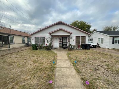 Bungalow-style home featuring a front lawn | Image 2