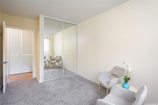 Bedroom #2 with new carpet, paint, and mirrored closet doors, ready to move right in! | Image 16