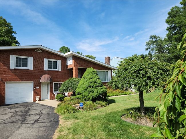 This is one of 2 entrances to this brick home. | Image 4