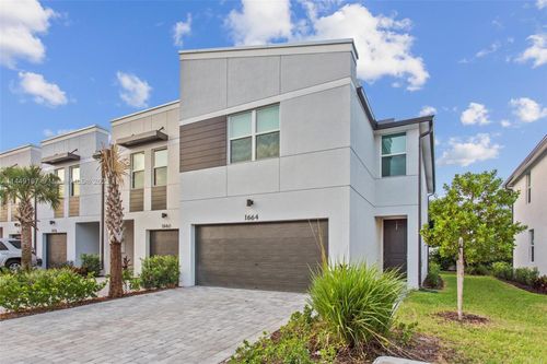 1664 Lindley St, Mangonia Park, FL, 33407-2123 | Card Image