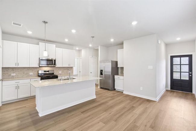 6717 Chinapkin Oak Ln, House other with 3 bedrooms, 2 bathrooms and 2 parking in Conroe TX | Image 5