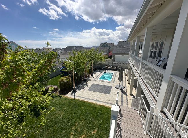 View of pool featuring a yard, a patio area, a fenced in pool, and a fenced backyard | Image 77
