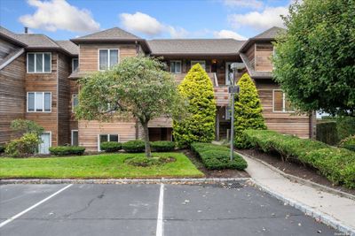 404 - 404 Fox Hill Drive, Condo with 2 bedrooms, 2 bathrooms and null parking in Calverton NY | Image 1