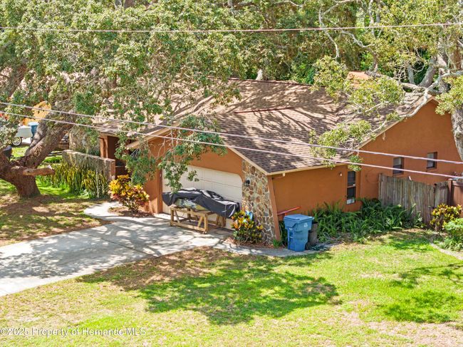 8268 Garrison St, House other with 3 bedrooms, 3 bathrooms and null parking in Spring Hill FL | Image 7