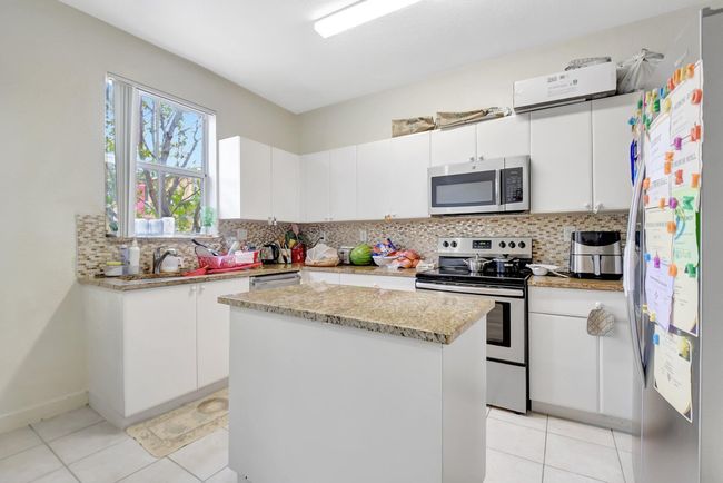 1910 Shoma Dr, Condo with 3 bedrooms, 4 bathrooms and null parking in Royal Palm Beach FL | Image 18
