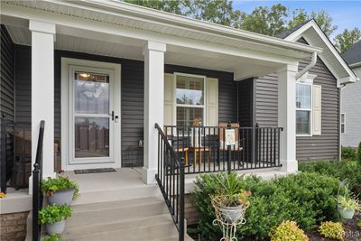 Doorway to property featuring covered porch | Image 3