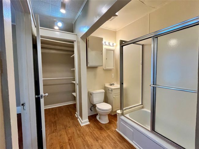 This is a view of the bathroom. Notice the tub/shower combo. | Image 6