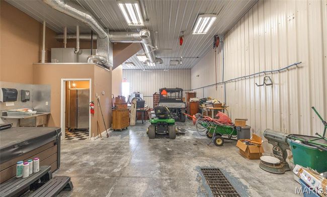 Detached Garage featuring workshop area | Image 55