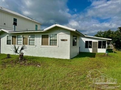 5609 Bayou Saint John Ave, House other with 3 bedrooms, 2 bathrooms and null parking in Orange Beach AL | Image 2