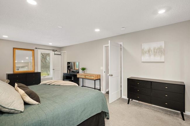 primary bedroom has entrance to upstairs bath | Image 16