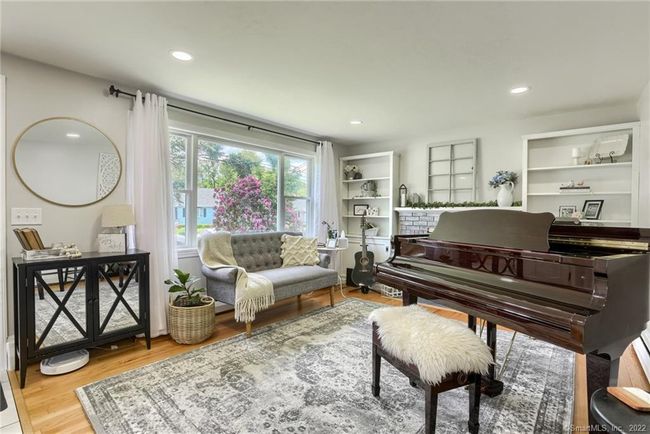 Living Room with large picture window and hardwood floors | Image 8