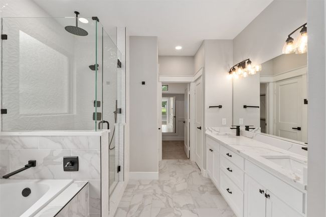Primary bath with separate shower, double sink and private water closet | Image 16