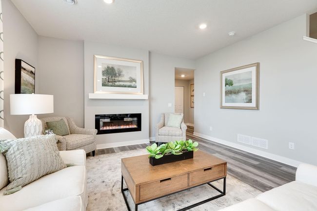 Or use it in the summer for the ambiance! Previously built model home, finishes, selections, and colors to vary from future built home. | Image 14