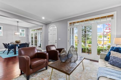 French doors let in lots of natural light and view of the park | Image 3