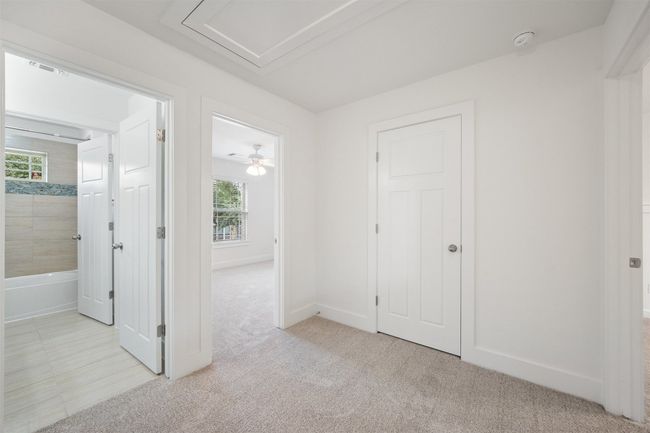 It leads to the guest bedrooms and full bath, with plenty of room to make it your own | Image 26