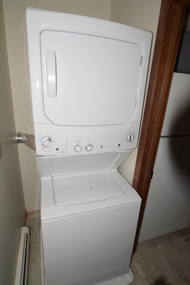 Laundry room off kitchen | Image 11