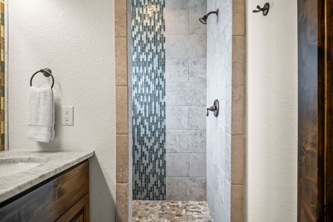 Beautifully tiled shower | Image 14