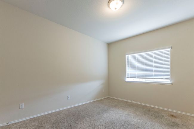 Empty room featuring baseboards and carpet | Image 18