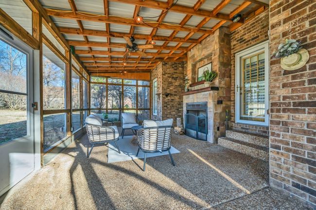 SCREENED PATIO w/ Gas Fireplace is a Total Vibe!!! CALM + ZEN Space for your Morning Yoga Routine, Coffee + Meditation | Image 37