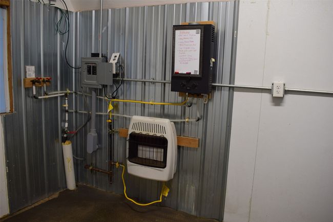 Utilities featuring heating unit | Image 74
