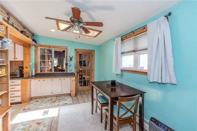 Side entry/mudroom into eat-in-kitchen | Image 3