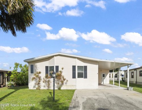 720 Periwinkle Cir, Barefoot Bay, FL, 32976-7675 | Card Image