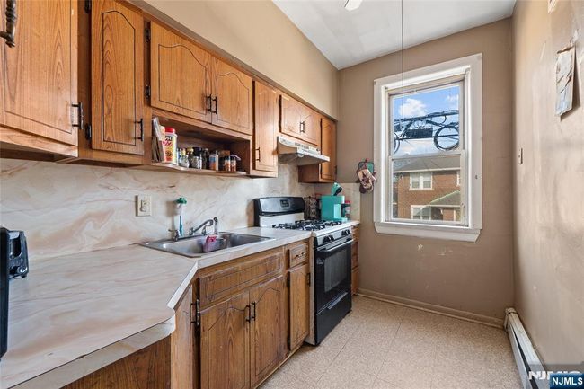 66 Harrison Ave, Home with 6 bedrooms, 2 bathrooms and null parking in Garfield NJ | Image 4