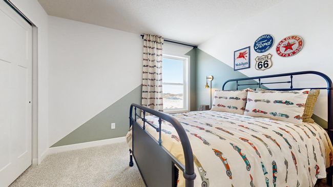 (Photo of a model home, actual features may vary) Another look at one of this home’s spacious secondary bedrooms. | Image 14