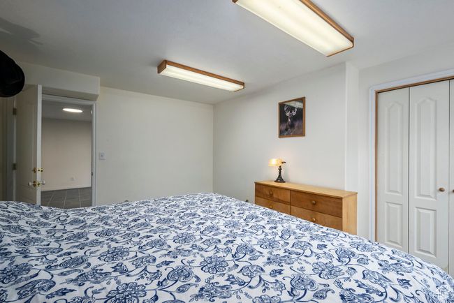 Tiled bedroom with a closet | Image 40