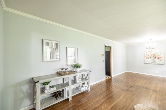 We've set this area up as a sitting area but leaving room for a large dining area as well. | Image 18