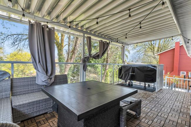 Sunroom with outdoor dining space and plenty of natural light | Image 39