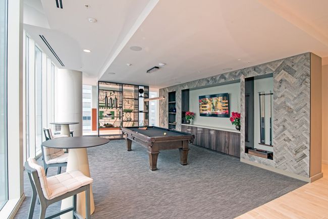 Adorned with polished wooden cues and well-worn chalk cubes, the 7th floor billiards room is a haven for enthusiasts of the game and amateurs alike, inviting everyone to enjoy a bit of friendly competition. | Image 53