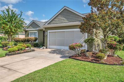 View of front facade featuring a garage and a front yard | Image 3