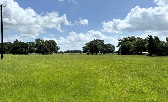 View from hilltop looking back towards front. | Image 6
