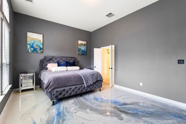Bedroom with baseboards, lofted ceiling | Image 14
