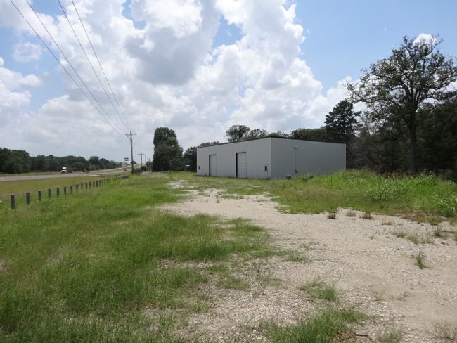 View of yard featuring a view of rural / pastoral area and an outbuilding | Image 12